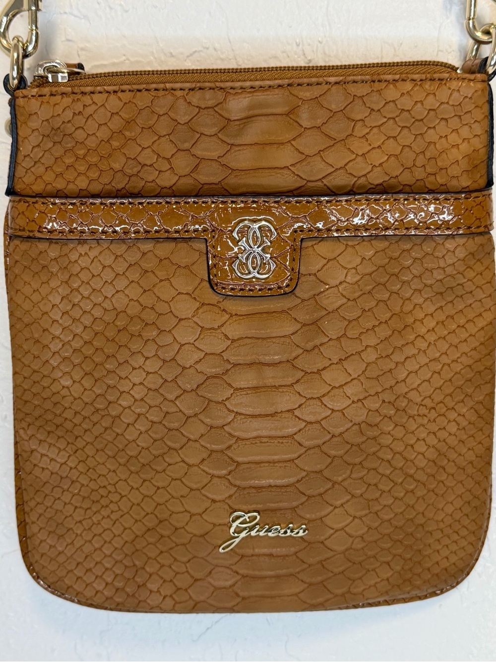 GUESS Tan Snake-Embossed Crossbody with Gold Accents